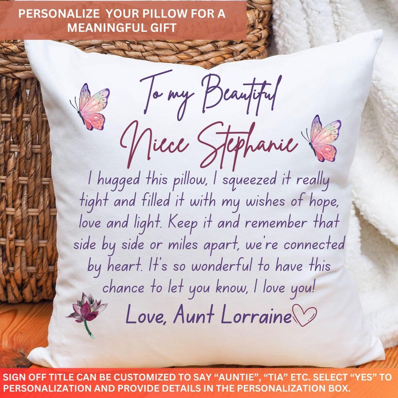 May include: White personalised cushion with text, butterflies, and a lotus flower. The cushion reads "To my Beautiful Niece Stephanie" with a heartfelt message from Aunt Lorraine. A meaningful gift.