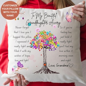 May include: A white pillow with a colorful tree design and the text "To My Beautiful Granddaughter Avery" and "Love, Grandma". The pillow has a message about love and hope.