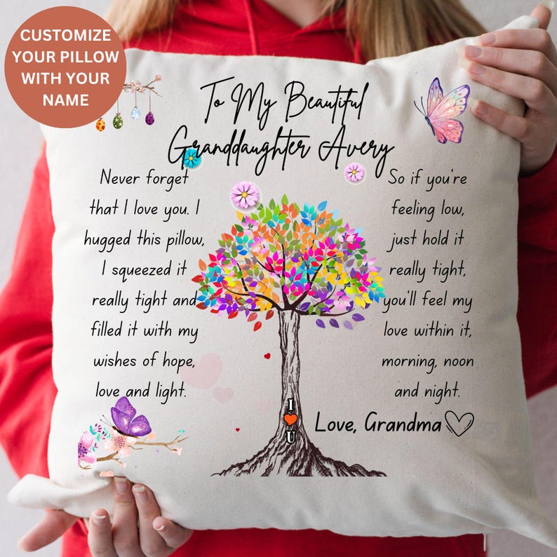 May include: A white pillow with a colorful tree design and the text "To My Beautiful Granddaughter Avery" and "Love, Grandma". The pillow has a message about love and hope.