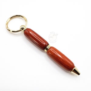 MINI handgedraaide houten balpen sleutelhanger - Padaukhout - GOUD
