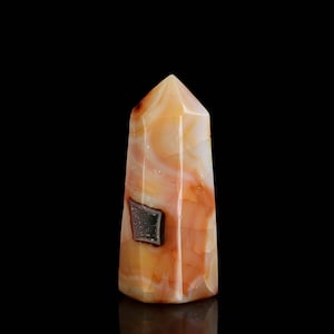 Carnelian Tower: Sacred Crystal for Manifestation, Protection, and Emotional Healing