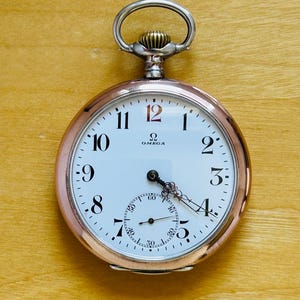 2T656 Antique Omega silver pocket watch, red 12, popular collection model