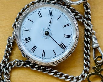 Reloj de bolsillo antiguo de plata esterlina 2Br835 con cadena de plata (835) y llave.