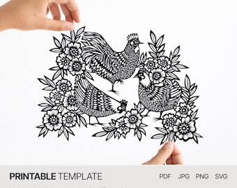 May include: Black and white printable template featuring three stylized roosters surrounded by flowers. The design is perfect for paper cutting or crafting.
