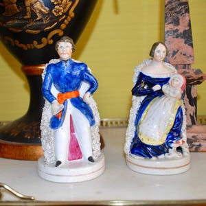 Antique pair of ceramic figurines of royal couple, Albert and Victoria, Staffordshire, England