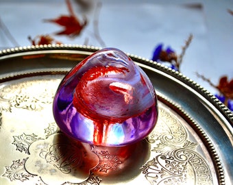 Caithness vintage handblown glass paperweight in an organic conical form with intriguing texture inside
