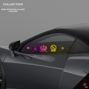 May include: A side window/glass holder collection, featuring neon-colored designs. The designs include a crown, a hand with a laser, and a "Please Don't Touch" symbol. The holder is shown on the side window of a gray sports car.
