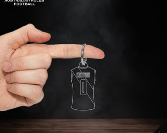 Projete seu próprio chaveiro com camisa de futebol com regras australianas