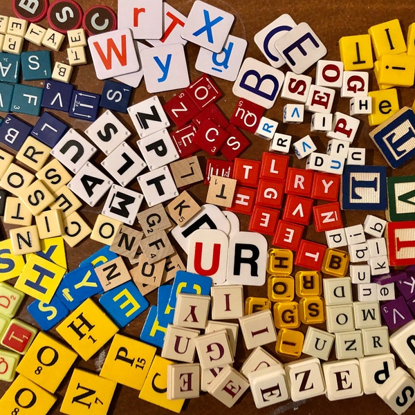 Mixed variety of colorful LETTER TILES from board games/learning activities for arts and crafts. Wood and plastic letters.