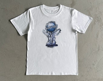 Lucki El mundo es la camiseta de algodón pesado de Lucki - El mundo es la camiseta de Lucki