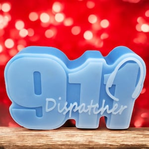 May include: A light blue 911 dispatcher soap bar with a headset graphic and the word "Dispatcher" written below the numbers.