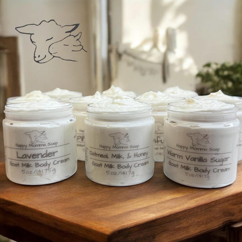 May include: Four glass jars of goat milk body cream with labels that read "Lavender", "Oatmeal, Milk, & Honey", "Warm Vanilla Sugar", and "Happy Momma Soap". Each jar contains 5 oz (141.75 g) of cream.