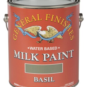 May include: A one-gallon can of General Finishes Milk Paint in the color Basil. The can is red with a white eagle and blue ribbon logo. The text "Since 1928" is printed on the can.