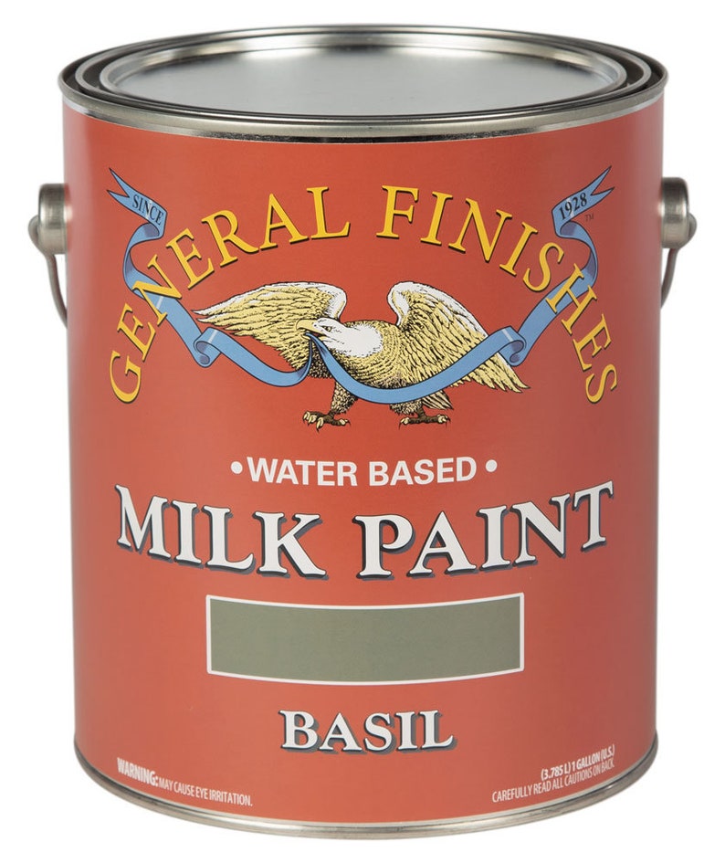 May include: A one-gallon can of General Finishes Milk Paint in the color Basil. The can is red with a white eagle and blue ribbon logo. The text "Since 1928" is printed on the can.