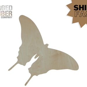 May include: A wooden butterfly cutout with a natural wood grain finish. The butterfly has detailed wing shapes and antenna. The text "FORGED TIMBER COMPANY" is in the upper left corner. The text "SHIPS FAST" is in a brown starburst.