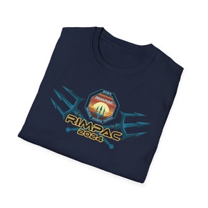 May include: A navy blue t-shirt with a graphic of a sunset and three tridents. The graphic includes the text "RIMPAC 2024" and "Partners, Integrated, Prepared".