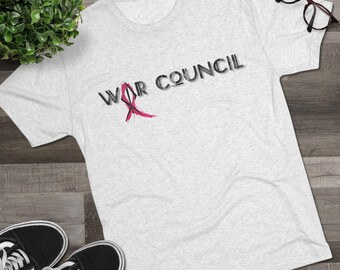 May include: A gray t-shirt with the text "WAR COUNCIL" in black letters and a pink ribbon graphic.