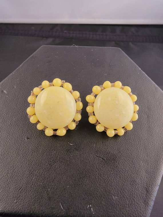 Vintage yellow glass clip on earrings