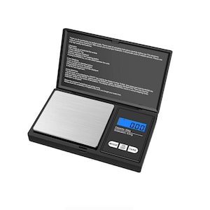 May include: A black digital pocket scale with a stainless steel weighing platform. The scale has a blue LCD display that reads "0.000". The display also shows "Capacity: 200g" and "Graduation: 0.01g". The scale has buttons for "Mode", "On/Off", and "Tare".
