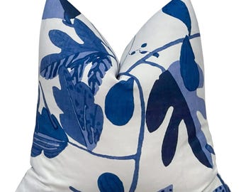 May include: Blue and white patterned cushion with a floral design. The cushion is made of a soft, comfortable fabric and is perfect for adding a touch of style to any room.