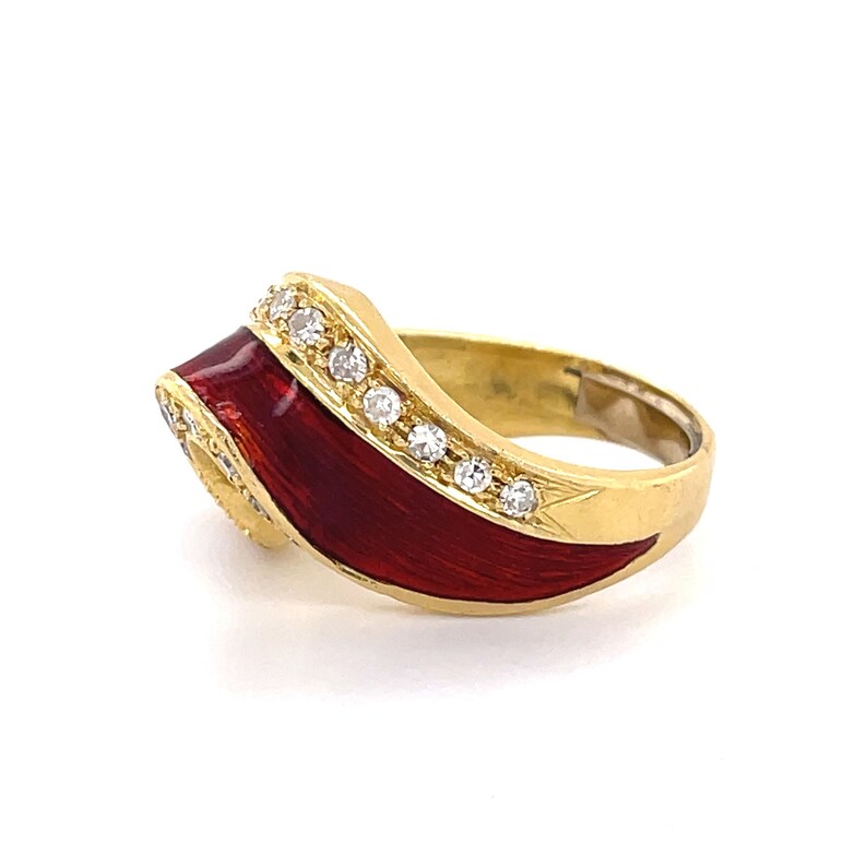 May include: A gold ring with a red enamel band and a row of clear diamonds. The ring is designed in a curved shape.