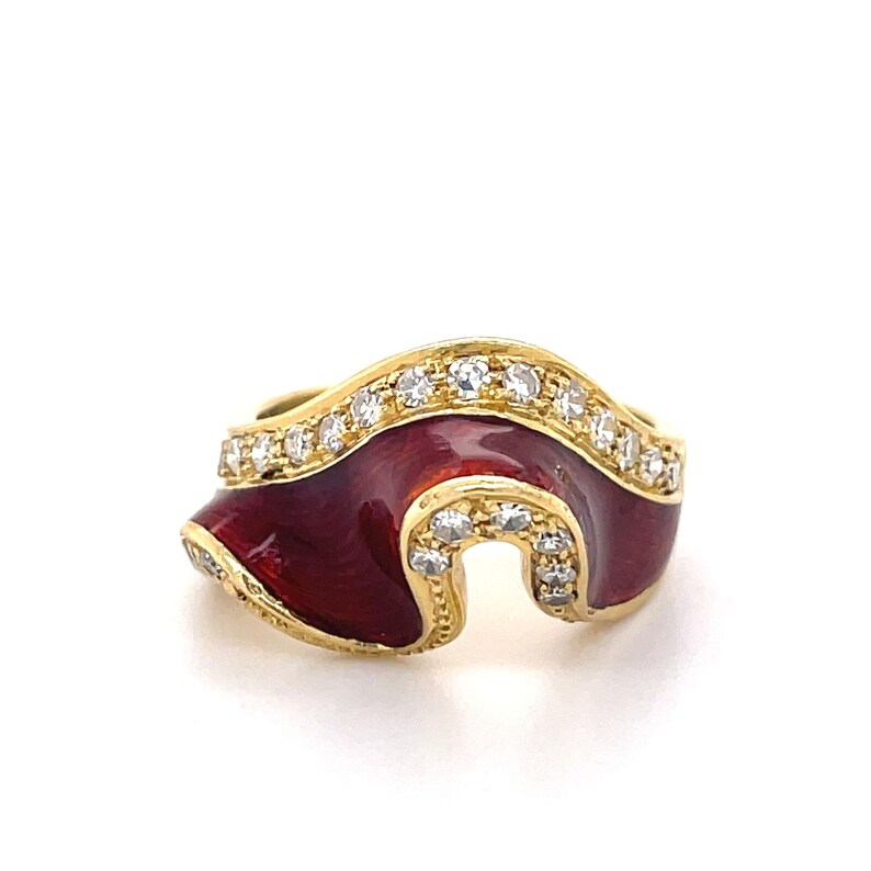 May include: A gold ring with a red enamel wave design and a row of clear diamonds around the edge.