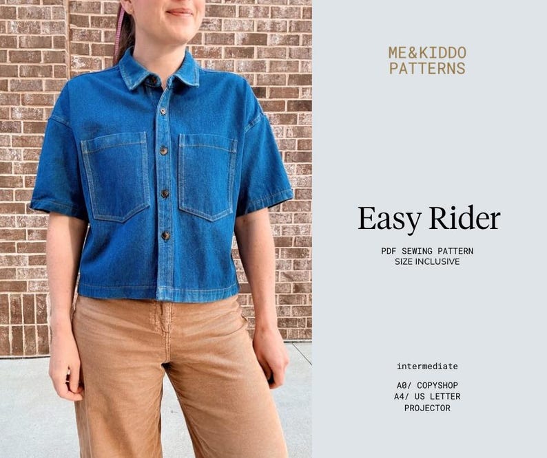 May include: A blue denim short-sleeved shirt with two front pockets and button fastenings. The shirt is worn with tan corduroy trousers. The text "Easy Rider" and "ME&KIDDO PATTERNS" are visible.