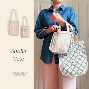 May include: Two quilted tote bags with dual handles. One bag features a solid beige quilted fabric with vertical stitching, while the other has a white quilted fabric with a blue and pink floral diamond pattern. Text reads Studio Tote.