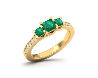 Maurya Three Stone Emerald Forever New Engagement Ring with Diamond Accents