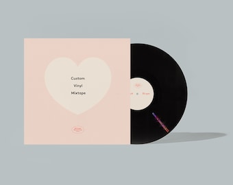 May include: A black vinyl record with a pink album cover. The cover features a white heart shape and the words "Custom Vinyl Mixtape". The record label reads "33 rpm".