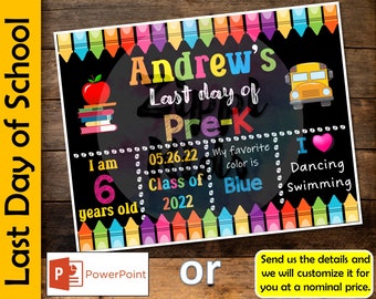 May include: A black chalkboard sign with colorful crayons at the top and bottom. The sign says "Andrew's Last Day of Pre-K" and includes details like age, favorite color, and activities. The sign is decorated with a school bus, books, and a heart.