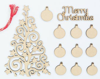 May include: A wooden Christmas tree craft kit with a cutout tree, ornaments, and the words "Merry Christmas".