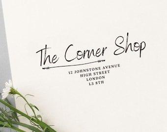 May include: Black and white stamp with the text "The Corner Shop" and the address "12 Johnstone Avenue, High Street, London, L3 8TH".