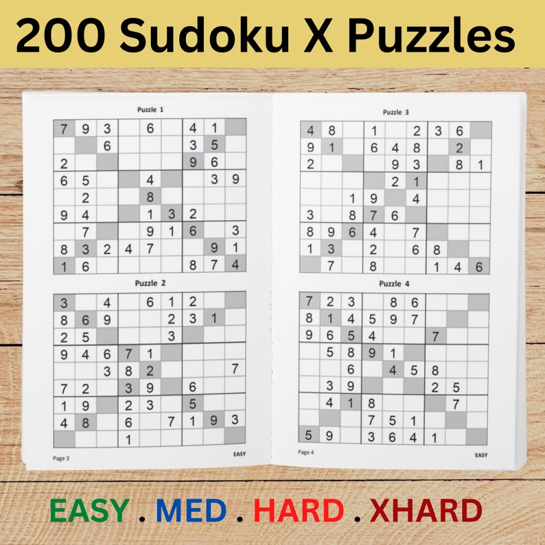 May include: A book titled "200 Sudoku X Puzzles" with four puzzles displayed. The puzzles are in a grid format with numbers. The difficulty levels are indicated at the bottom: EASY, MED, HARD, and XHARD. The book is open on a light wood surface.