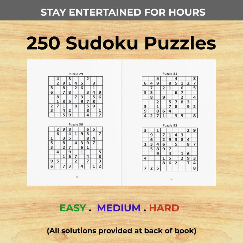 May include: A collection of 250 Sudoku puzzles, divided into three difficulty levels: Easy, Medium, and Hard. The puzzles are printed on white paper with black ink. The text "STAY ENTERTAINED FOR HOURS" is printed at the top of the page, and the text "(All solutions provided at back of book)" is printed at the bottom of the page.