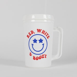 May include: White plastic cup with a red, white, and blue design. The cup has a handle and says "Red, White & Boozy" with a smiley face with stars for eyes.