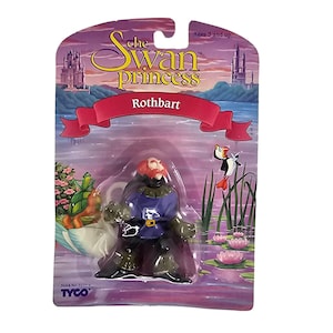 May include: The Swan Princess Rothbart action figure in original packaging. The figure is wearing a purple cape and tunic. The packaging features a lake scene with a castle, a swan, and the text "Ages 3 and up."