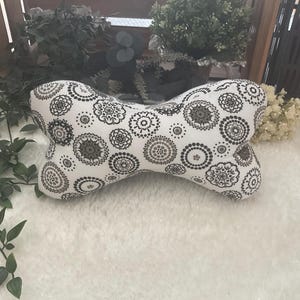 Cuscino cervicale, supporto cervicale, cuscino osseo, osso per leggere, fermalibri, cuscino coccoloso, cuscino osseo per bambini