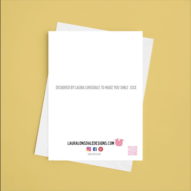 May include: A white greeting card with a matching envelope, set against a yellow background. The card features the text "DESIGNED BY LAURA LONSDALE TO MAKE YOU SMILE XXX" in gray. The bottom of the card displays the website address and social media icons.