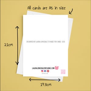 May include: A white A5 greeting card, 21cm x 14.8cm, with a white envelope. The card has text that reads "DESIGNED BY LAURA LONSDALE TO MAKE YOU SMILE XXX" and "LAURALONSDALEDESIGNS.COM".