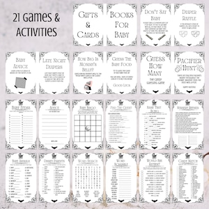 May include: A collection of 21 baby shower games and activities printed on white cards with black decorative borders. Games include advice, bingo, word searches, and more. Text includes "Gifts & Cards" and "Books for Baby."