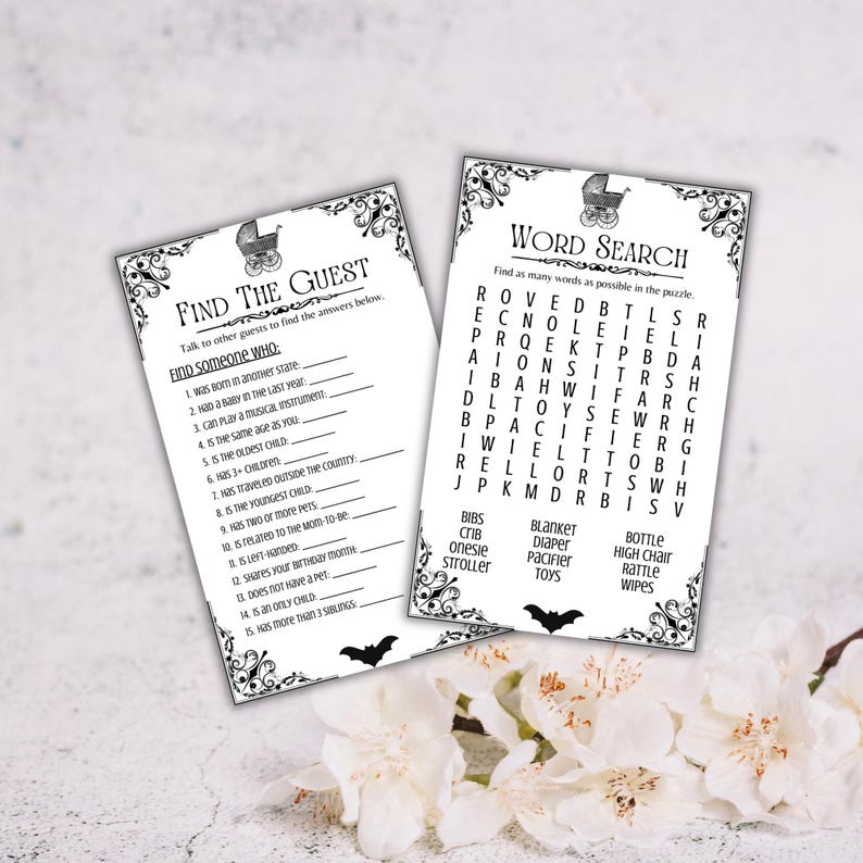 May include: Two black and white baby shower game cards. One card is titled "Find the Guest" with fill-in-the-blank prompts. The other card is a "Word Search" puzzle with baby-related words. Both cards have decorative borders and a baby carriage graphic.