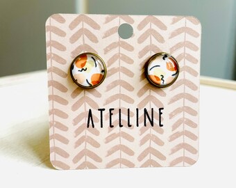 Stud earrings with abstract cabochon pattern, patterned glass