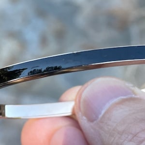 Vintage 14kt bangle bracelet with black enamel