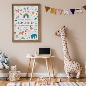 May include: A framed print with a colorful illustration of a rainbow, sun, clouds, and animals. The text reads "In the beginning God created the heaven and the earth, Genesis 1:1".