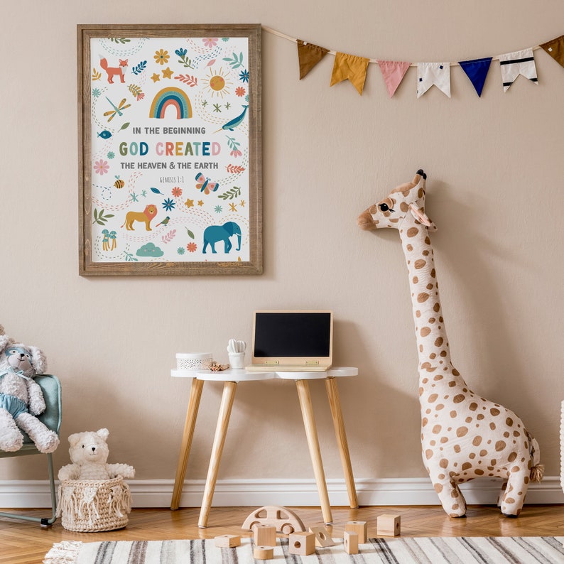 May include: A framed print with a colorful illustration of a rainbow, sun, clouds, and animals. The text reads "In the beginning God created the heaven and the earth, Genesis 1:1".