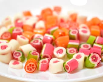 Lollipop candy, natural sweets, orange, cranberry, rhubarb