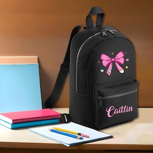 Mini sac à dos personnalisé pour filles avec noeud rose et nom personnalisé pour sac de pépinière de retour à l'école