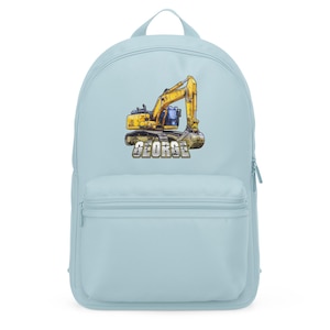 May include: A light blue backpack featuring a yellow and black excavator illustration with the name "GEORGE" in bold letters. The backpack has a front pocket and a zipper closure, ideal for carrying school supplies or personal items.