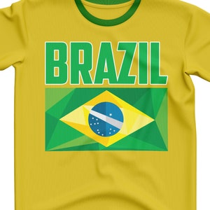May include: Yellow t-shirt with a green collar and the word "BRAZIL" in green letters. The shirt features a green, yellow, and blue Brazilian flag.